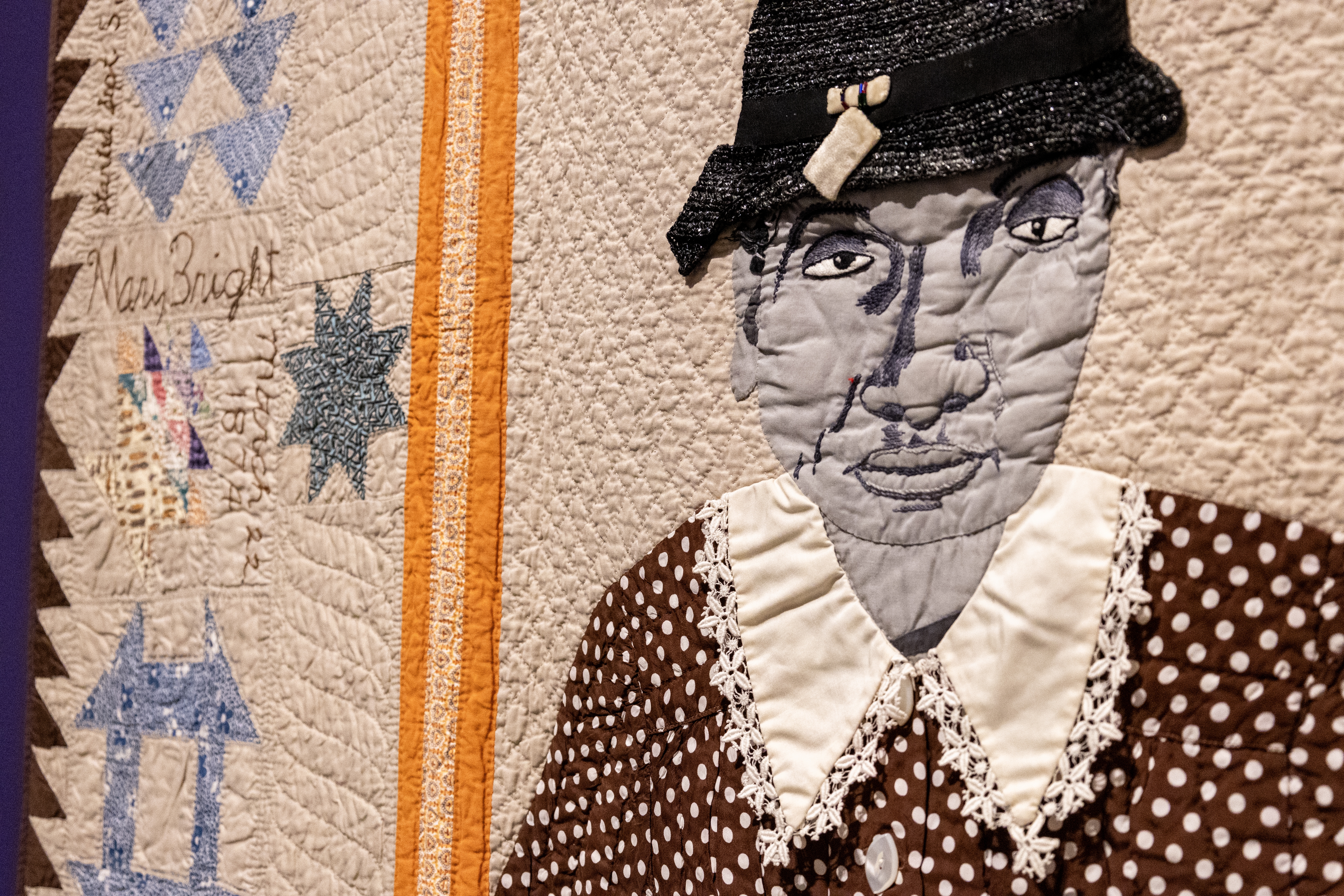 Artist Alice Neal made this quilt, <em>Mary Bright Commemorative Quilt (with Dresden Plate, Monkey Wrench, Wild Goose Chase, Fan, Basket of Flowers, Star of Lemoyne, Nine Patch Blocks)</em>, in honor of her mother. It
